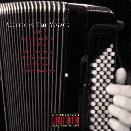 Close-up of a blackSS black accordion withCCL with text and a hand.