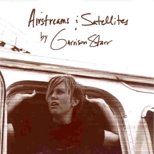 CD cover: woman looking out of an Airstream trailer window.