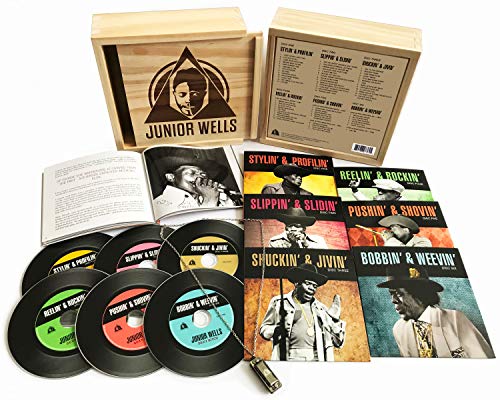 Wooden box set containing Junior Wells blues CDs and booklet.
