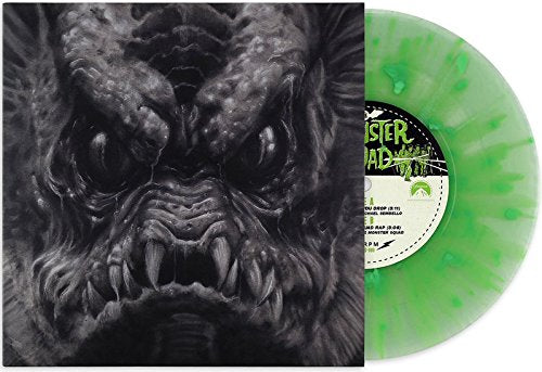 Close-up of monster face on album cover with green swirl vinyl record.