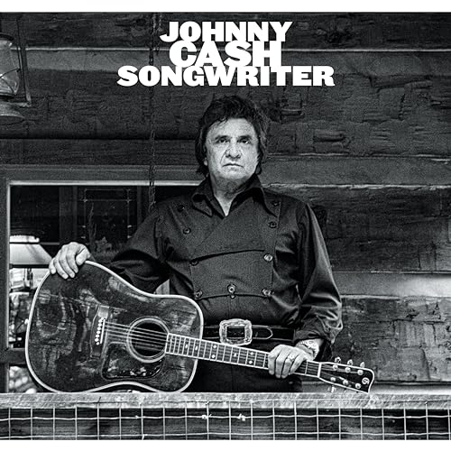 Johnny Cash portrait with acoustic guitar, album cover in grayscale.
