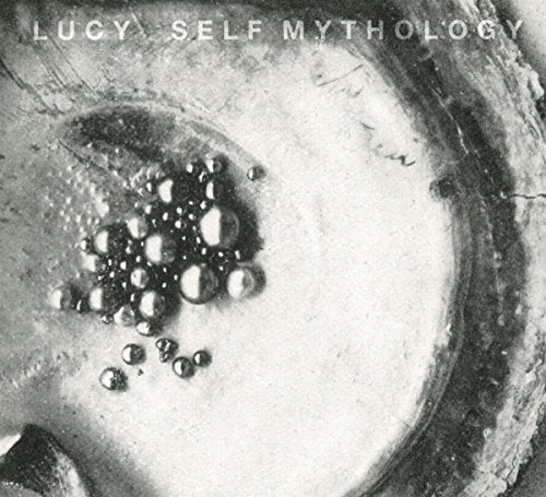 CD cover for “Self Mythology” featuring a close-up of an eye with beads.