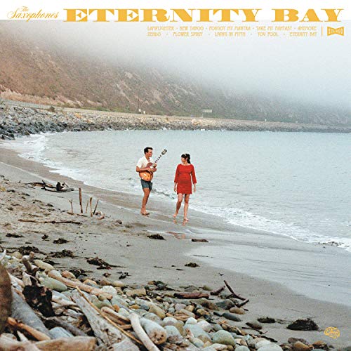 CD cover: couple walking on a beach, foggy landscape.