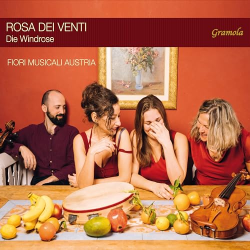 CD cover with musicians, fruit, and a framed floral painting.