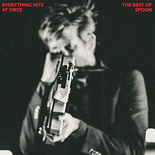 Black and white album cover featuring a musician with a guitar.