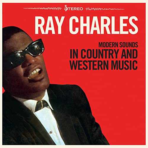 Ray Charles album cover, red background, portrait with sunglasses.