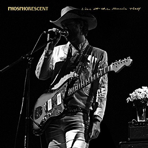 Black and white album cover featuring a musician with a guitar.