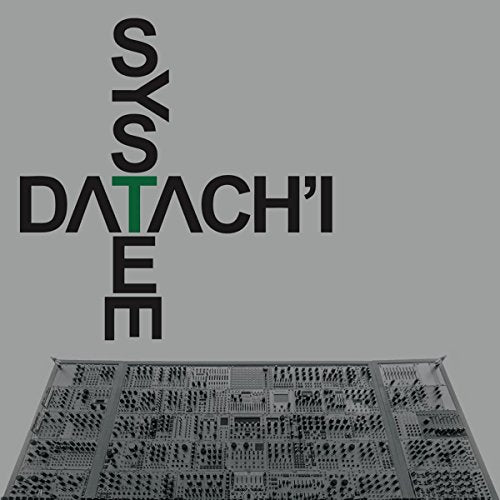 Record album cover with dark text and a grid-like electronic circuit.
