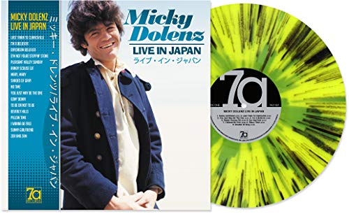Micky Dolenz album cover and vibrant yellow-green swirl vinyl record.