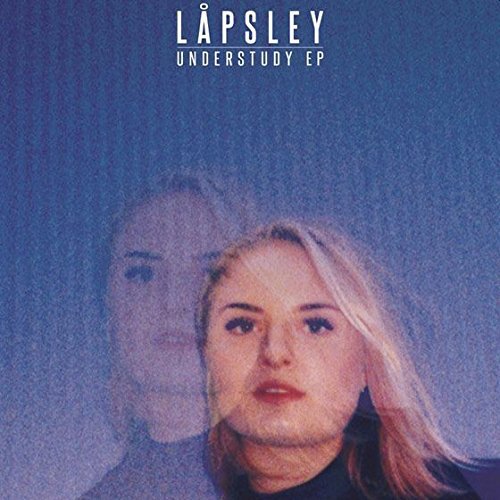 Vinyl record cover: blurry portrait of a woman with another face behind her.