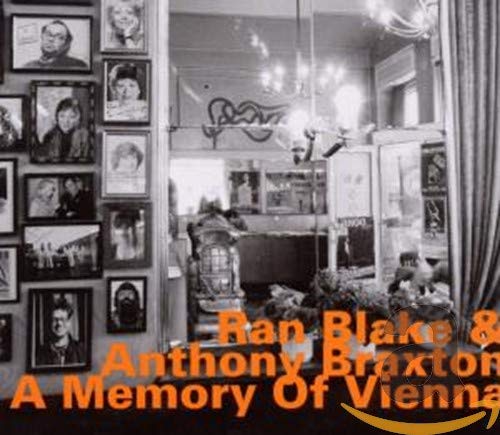 CD cover with black and white portraits in ornate frames, text overlay.