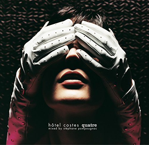 Record album cover: face obscured by white, studded leather gloves.