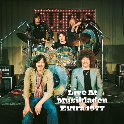 1977 album cover featuring the rock band PUHDYS posing with their instruments.