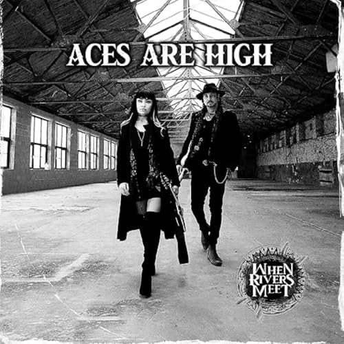 CD cover: two musicians with guitars in a textured, industrial space.