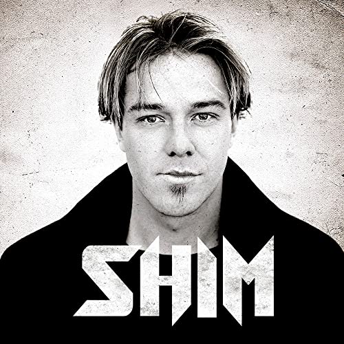 Black and white portrait of a man with the word "SHIM" below.