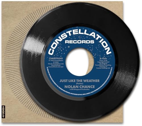 Black vinyl record with blue label, reading "Nolan Chance - Just Like The Weather".