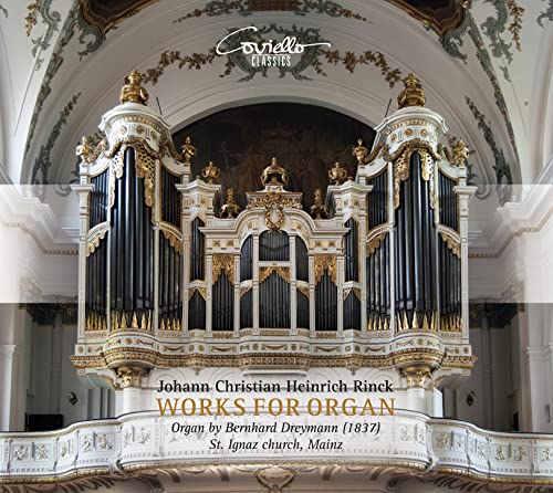 Ornate gold organ pipes inside a church, CD cover art.