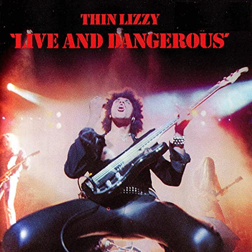 Album cover for Thin Lizzy’s “Live and Dangerous” featuring a bassist onstage.