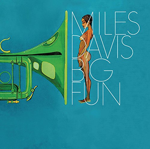 Teal album cover with green trumpet and nude woman beside Miles Davis text.