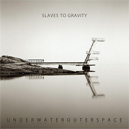 CD cover featuring a diving platform reflecting in still water under a grey sky.