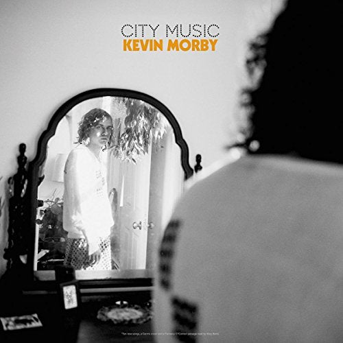 Black and white album cover featuring a man looking in a mirror.