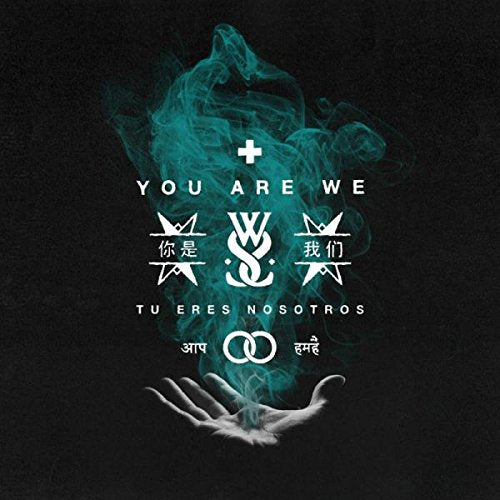 CD cover for While She Sleeps’ “You Are We” with smoke and hands.