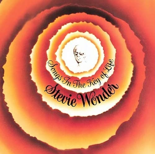 Stevie Wonder Songs In The Key Of Life album cover with orange concentric circles.