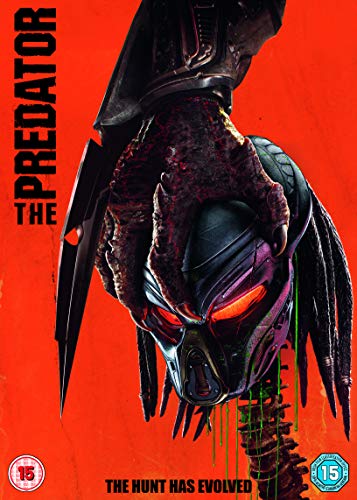 Predator movie cover: close-up of alien hunter’s mask on red background.