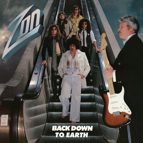 1970s band Zon on an escalator, album cover for "Back Down To Earth".