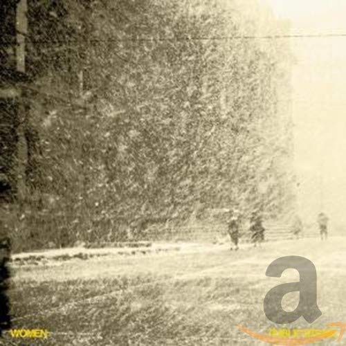 Sepia-toned image of a snowy street with blurred figures walking past trees.