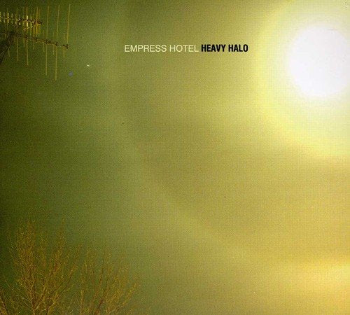 CD cover: green sky, bright sun, antenna, and text “Heavy Halo”.