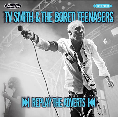 CD cover: black and white photo of a singer with a microphone.