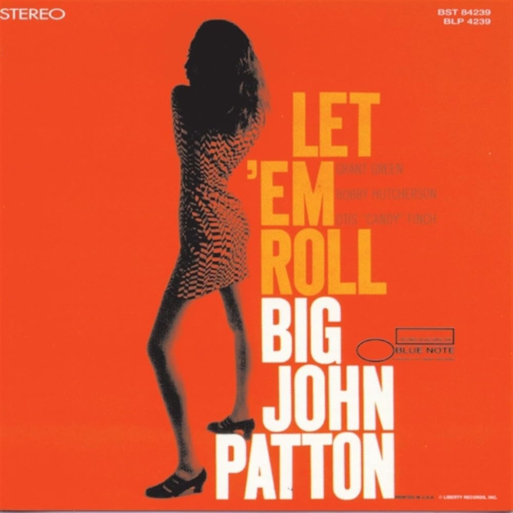 Red album cover featuring silhouetted figure and bold text: "Let 'Em Roll.