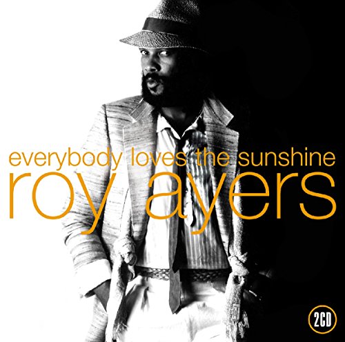 Black and white portrait of Roy Ayers with orange text overlay.