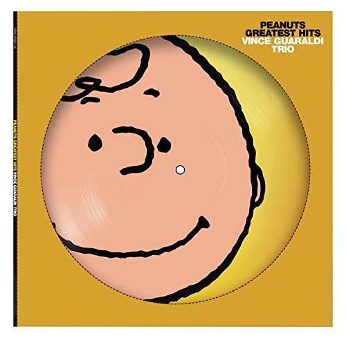 Peanuts Greatest Hits" vinyl record cover featuring a smiling Charlie Brown illustration.