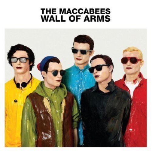 Album cover featuring five men in colorful clothing and sunglasses against a white background.