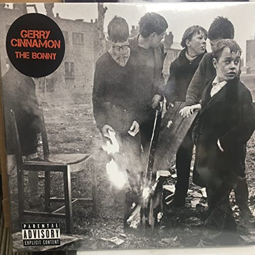 Vinyl record cover: black and white photo of people around a fire.