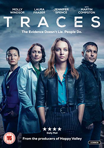 DVD cover for “Traces” featuring four serious-faced people against a dark backdrop.