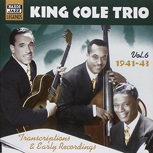 Nat King Cole Trio album cover featuring three musicians with instruments.