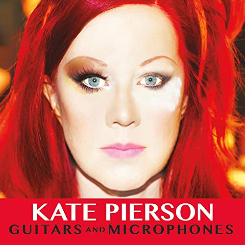 Close-up portrait of red-haired Kate Pierson, album cover for "Guitars & Microphones".