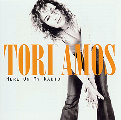 Tori Amos album cover, featuring a portrait of the artist in orange text.