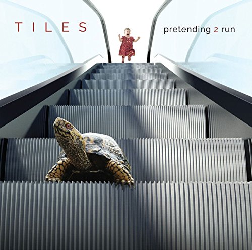 CD cover: a tortoise on an escalator, with a small child above.