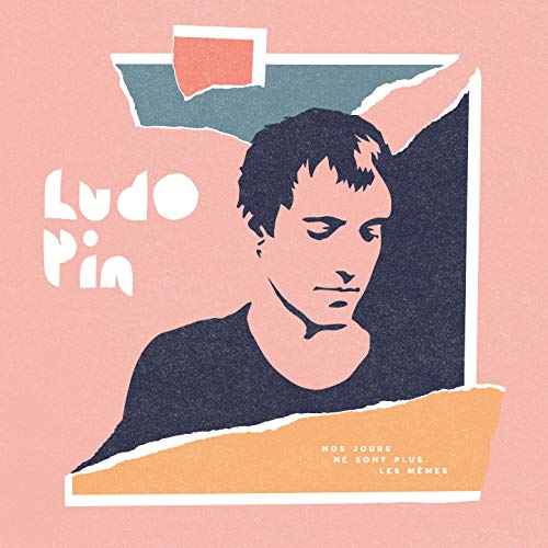 Record album cover with a portrait of a man and torn paper details.