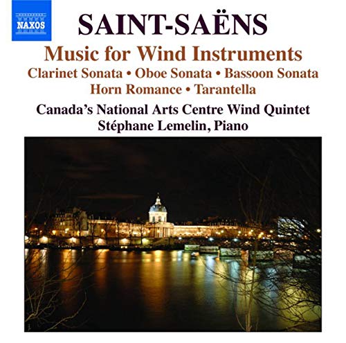 CD cover for Saint-SaĆ«nsā āMusic for Wind Instrumentsā with a nighttime cityscape.