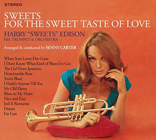 CD cover featuring a woman with a trumpet, orange background, and text.