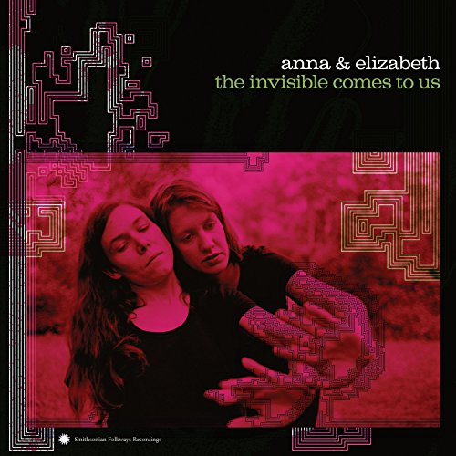 CD cover featuring two women in pink and black geometric patterns.