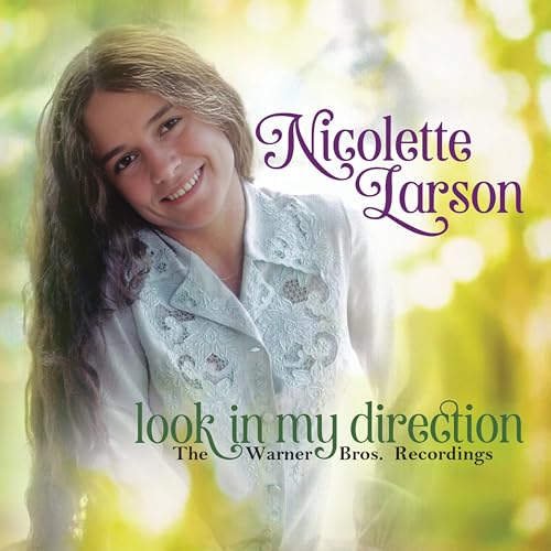 CD cover featuring singer Nicolette Larson with soft focus background.