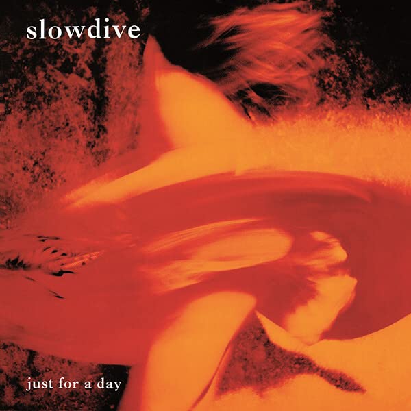 Blurred orange and red album cover for Slowdive’s “Just For A Day”.