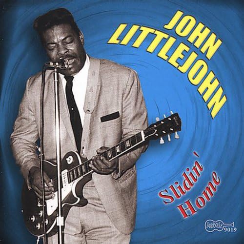 John Littlejohn playing guitar, album cover with blue swirl background.