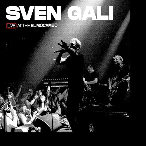 Black and white concert photo of Sven Gali performing live onstage.